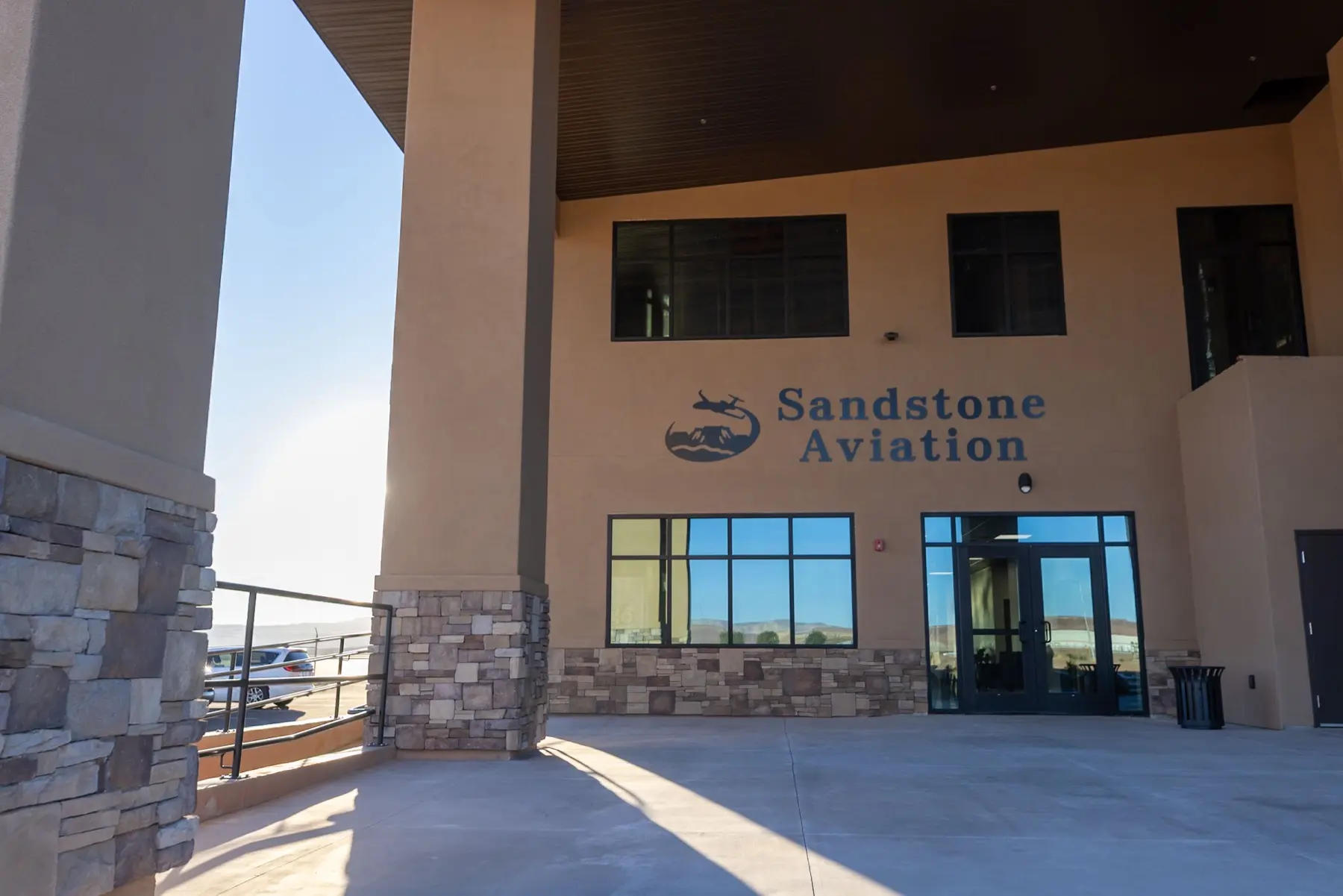 Main entrance and exterior signage at Sandstone Aviation.